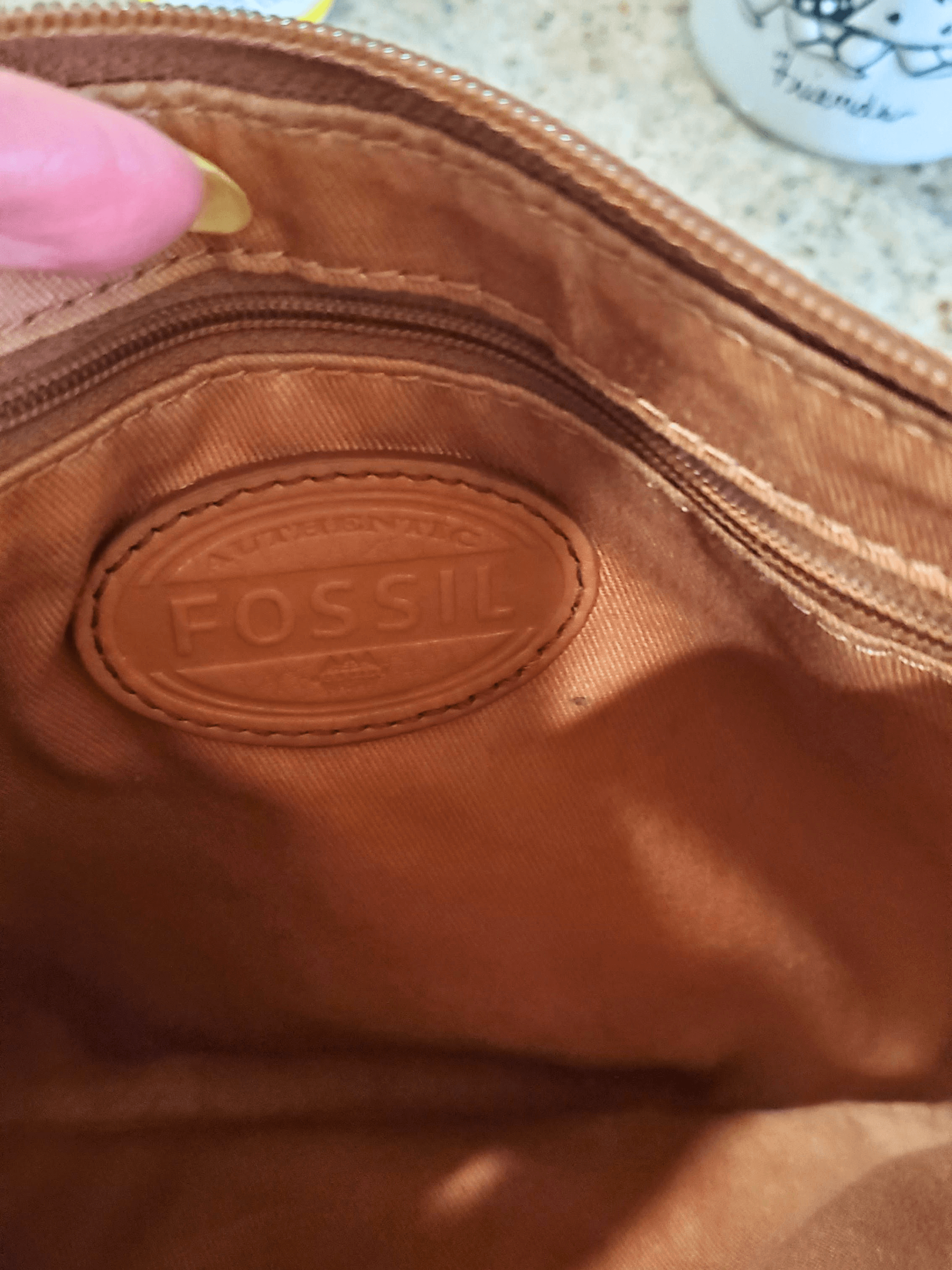 Fossil, Front. Condition: Good.