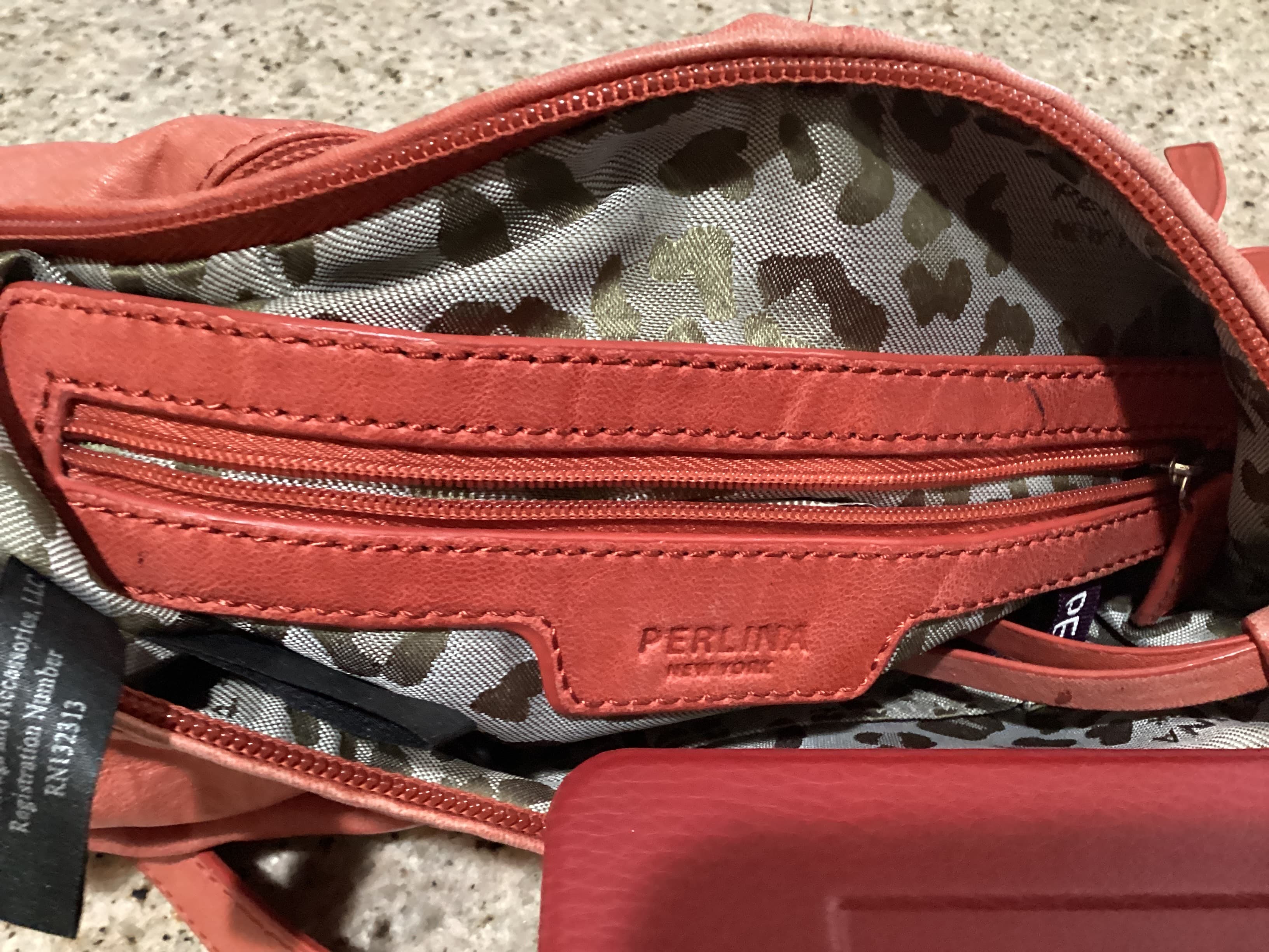 Perlina , Front. Condition: Fair.