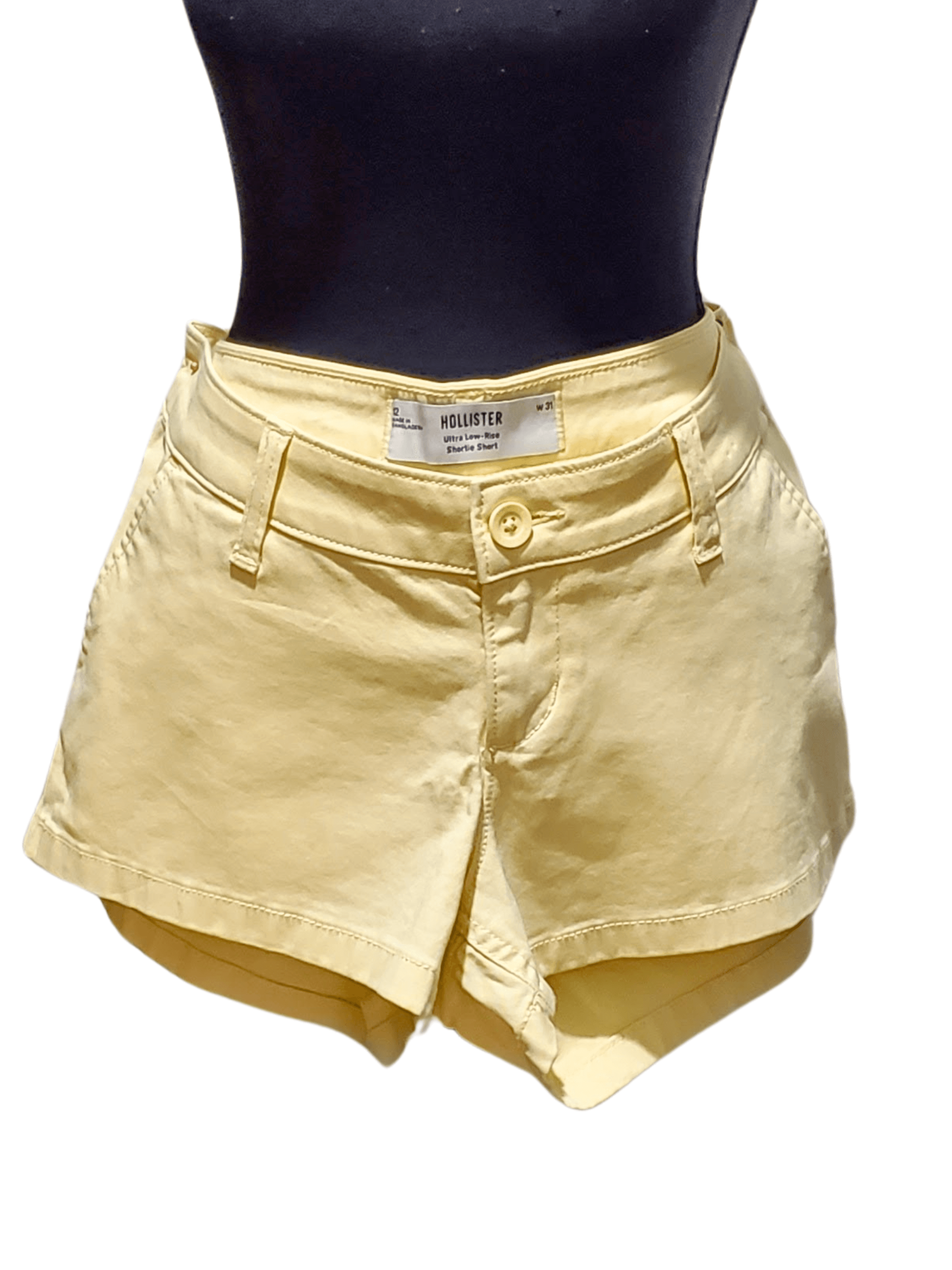 Hollister, Hollister — Ultra low Rise Shortie shorts. Pale yellow size 12, mint