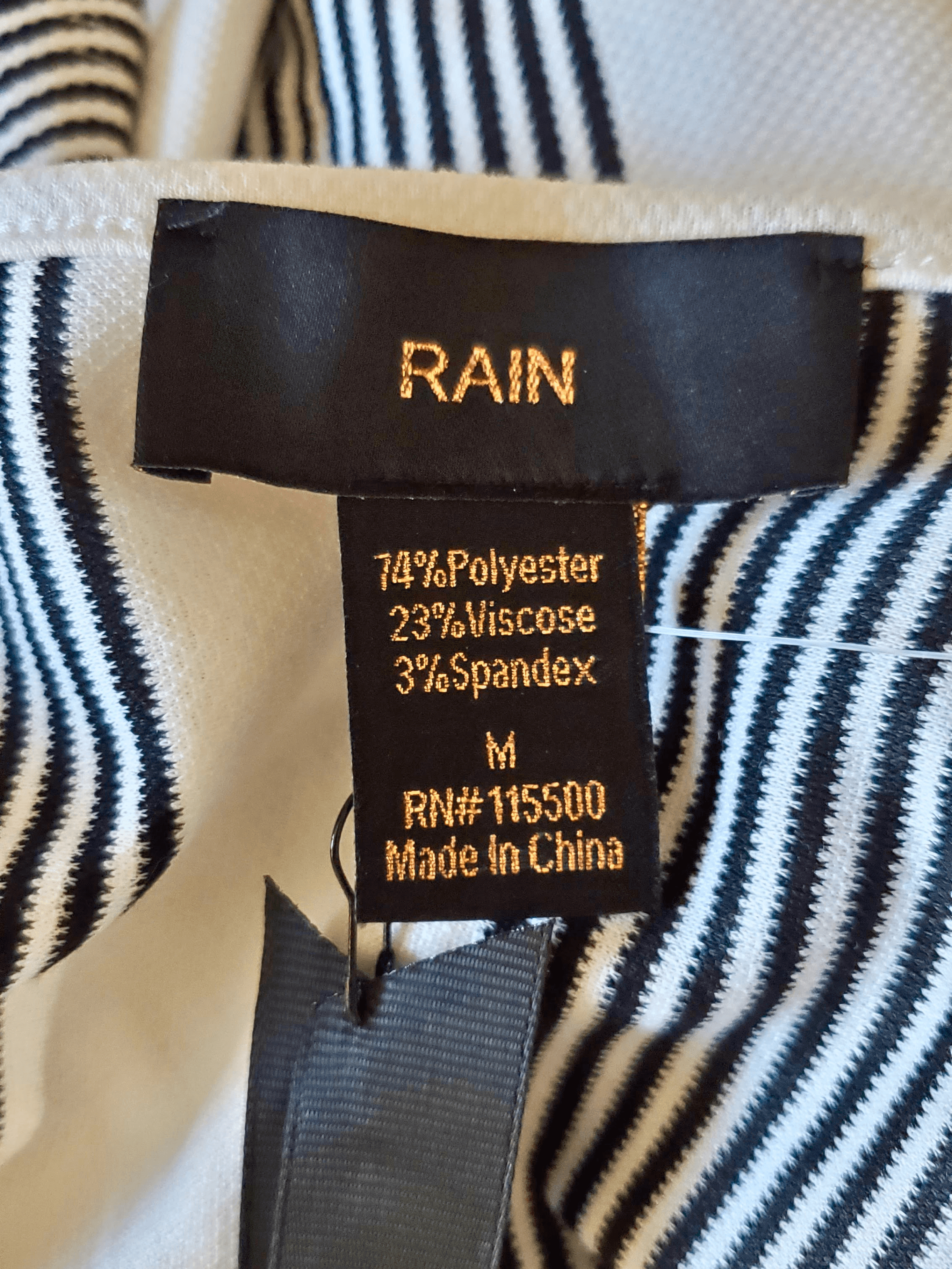 Rain, Front. Condition: Mint.